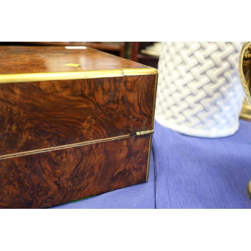 137 - A 19th century burr walnut and brass mounted writing box with fitted interior and three 