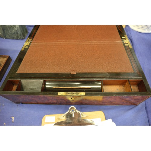 137 - A 19th century burr walnut and brass mounted writing box with fitted interior and three 