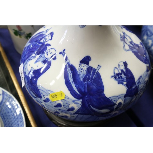 205 - A pair of Chinese blue and white bulbous figure decorated vases, now table lamps, on hardwood bases,... 