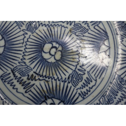 73 - A Chinese blue and white jardiniere with figures in a landscape, 9 1/2