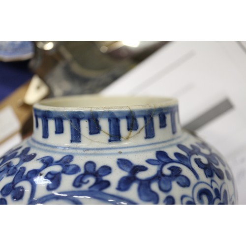 73 - A Chinese blue and white jardiniere with figures in a landscape, 9 1/2