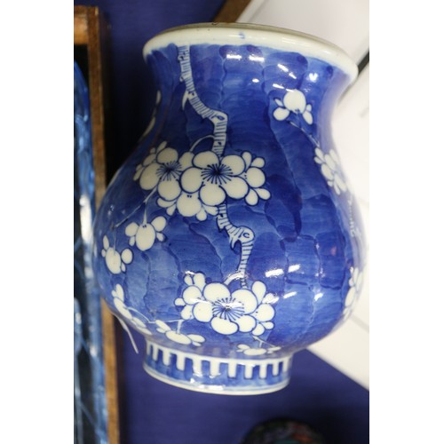 73 - A Chinese blue and white jardiniere with figures in a landscape, 9 1/2