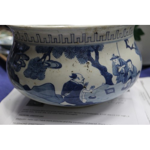 73 - A Chinese blue and white jardiniere with figures in a landscape, 9 1/2