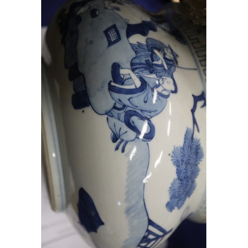 73 - A Chinese blue and white jardiniere with figures in a landscape, 9 1/2