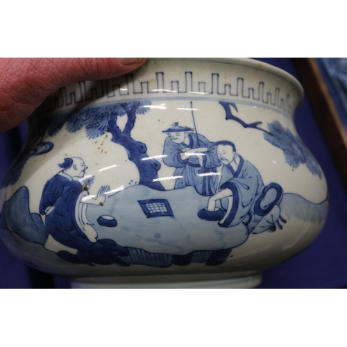 73 - A Chinese blue and white jardiniere with figures in a landscape, 9 1/2