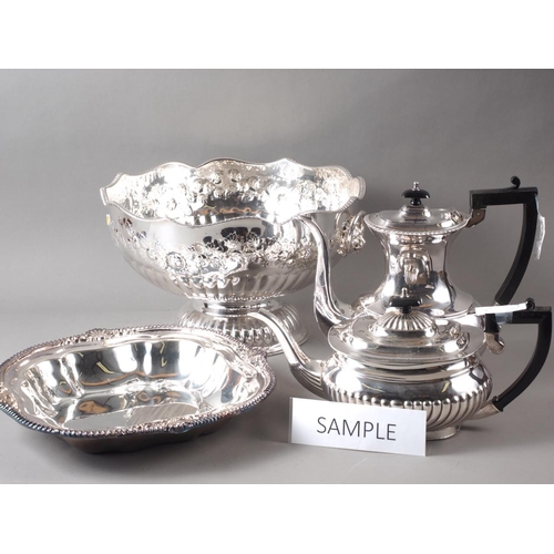 223 - A silver plated punch bowl, a pair of plated trays, a ham stand and other plate