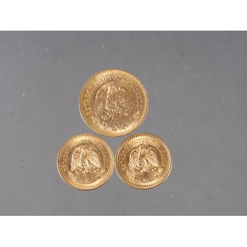 304 - A Mexican 5 pesos gold coin and two Mexican 2 1/2 pesos gold coins, 8.3g gross