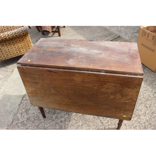 417 - A 19th century mahogany single drop leaf dining table, on turned and tapering supports, 34 1/2