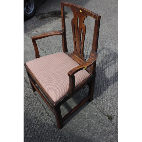 420 - A Georgian provincial oak carver chair with drop-in seat, on square taper supports (repairs)