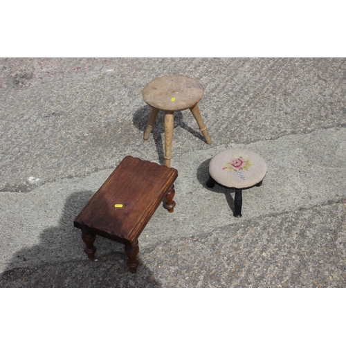 451 - A pair of oak stools with elm tops, another smaller similar stool and two others