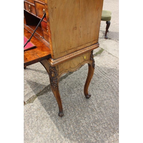 457 - An early 18th century figured walnut and feather banded secretaire abbatant, the upper section fitte... 