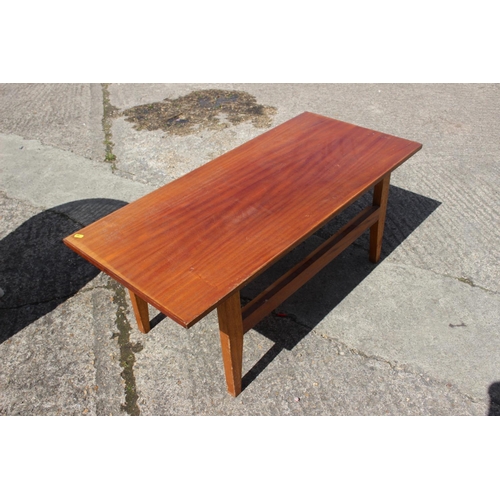 524 - A modern burr maple slice top occasional table, on panel end supports, 23