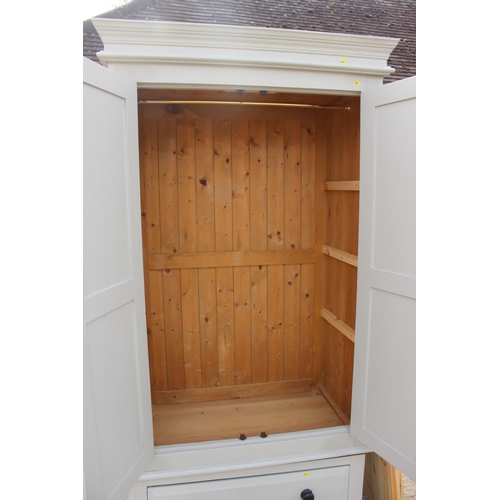 549 - A 19th century French armoire enclosed two panelled doors, on square taper supports, 49