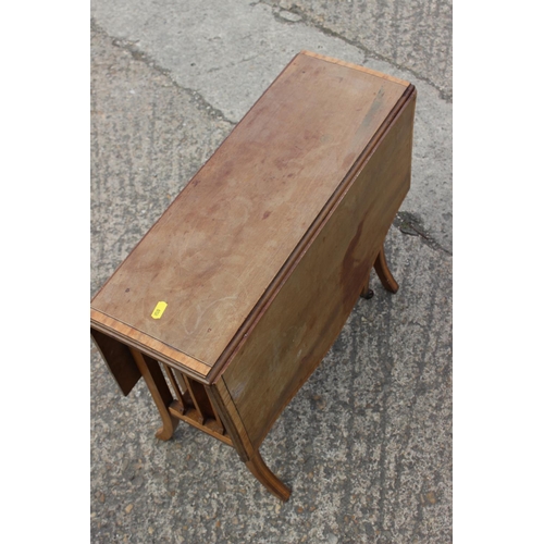 578 - An Edwardian walnut and satinwood banded Sutherland table,  21