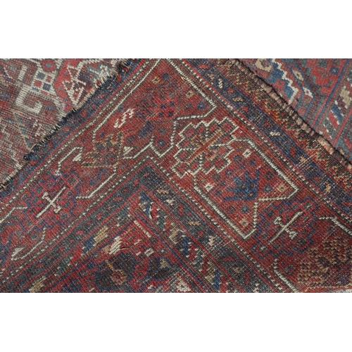 597 - A Kazak style rug with three medallions, 72