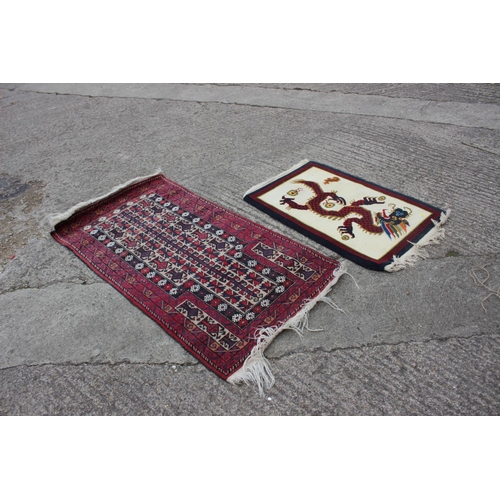 602 - A Bokhara prayer rug of traditional design in shades of red, blue, brown, grey and natural, 32