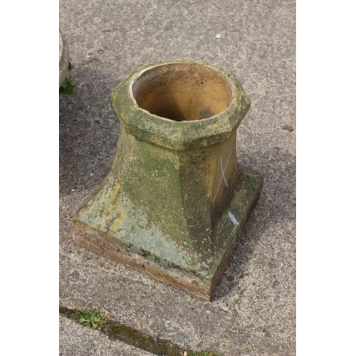 643 - A terracotta square base chimney pot, 14