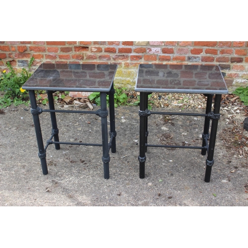 645 - A pair of black marble top logia tables, 18