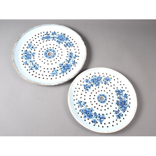 65 - A Chinese export blue and white circular dish drainer with landscape decoration, 13