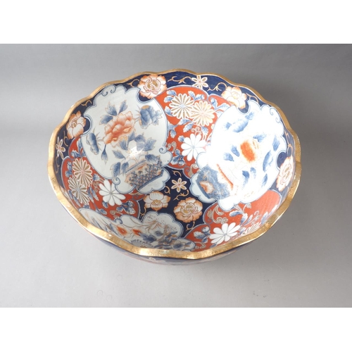 78 - An Imari deep bowl/jardiniere with flower decoration and gilt border, 18