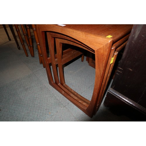 558 - A nest of three G Plan teak occasional tables, largest 21