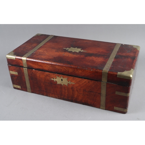 128 - A 19th century mahogany and brass mounted writing box with fitted interior, secret drawers and inkwe... 