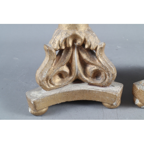 131 - A pair of 19th century Venetian carved giltwood spiral stem and acanthus scroll trefoil base pricket... 