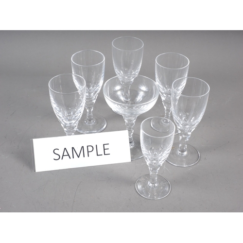 17 - A set of seventeen port glasses with faceted stems and two matching glasses