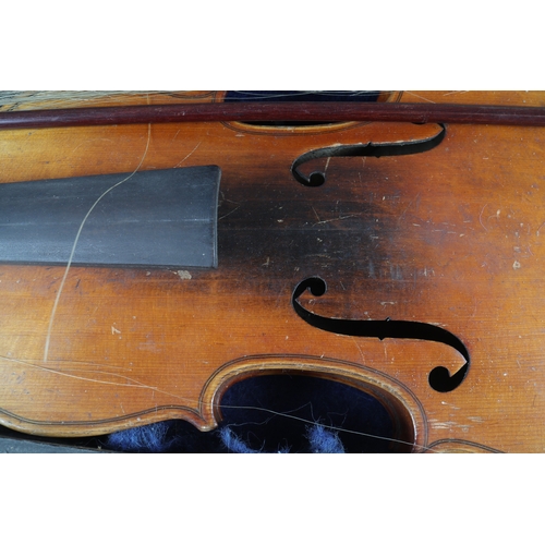 177 - A student's violin, and bow, in a wooden caseViolin is 23