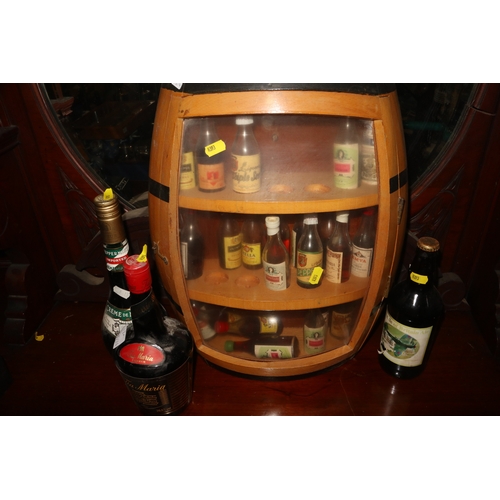 180 - A large collection of spirit miniatures, including brandies, whiskies, liqueurs, etc, in all some 15... 