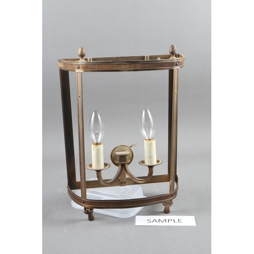 197 - A pair of green and gilt metal framed glass fronted wall lights, 12 1/4