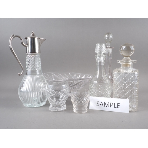 28 - A glass and silver plate mounted claret jug, three decanters, two glass bowls and other items