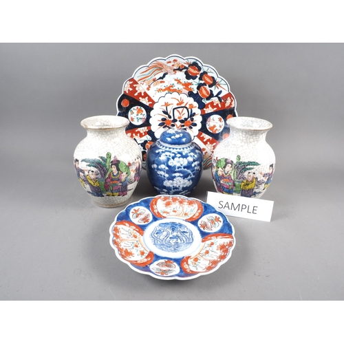 74 - A pair of Chinese crackle ware vases with polychrome decoration, two Imari plates and other Oriental... 