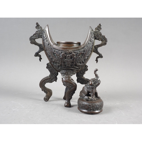 83 - A Chinese bronze censer, decorated clouds, with elephant finial, 10