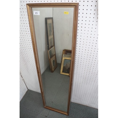 475 - An ebonised framed wall mirror, 20