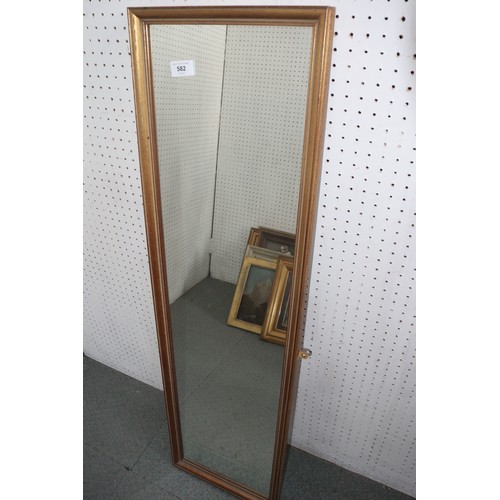 475 - An ebonised framed wall mirror, 20