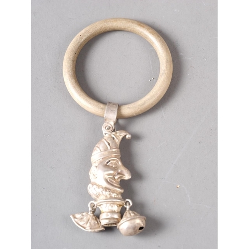 231 - An Edwardian silver baby rattle, formed as Punch, with teething ring