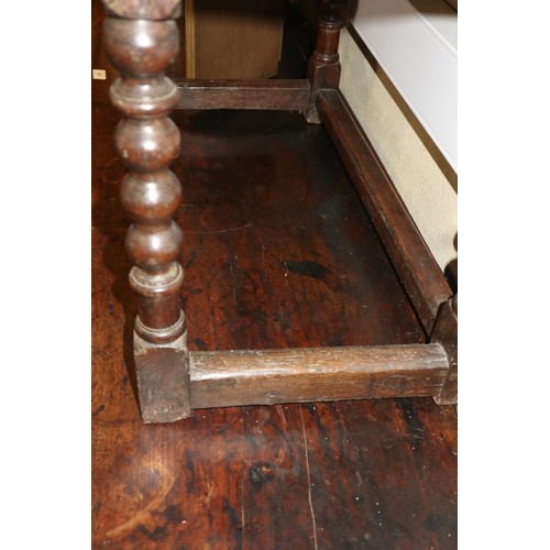 410 - An 18th century fruitwood dresser base, fitted one short and two long fielded panel front drawers, o... 