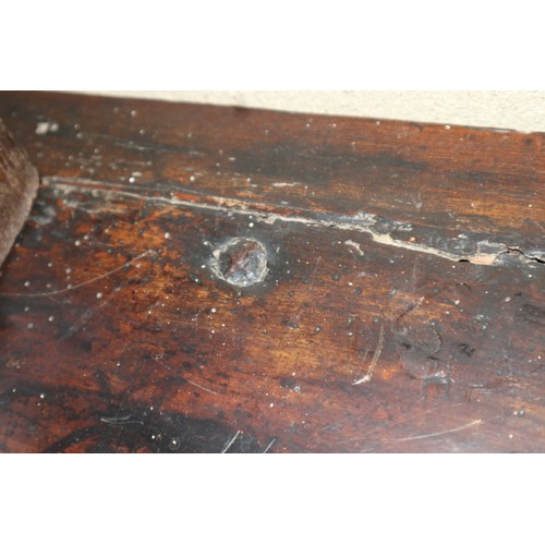 410 - An 18th century fruitwood dresser base, fitted one short and two long fielded panel front drawers, o... 