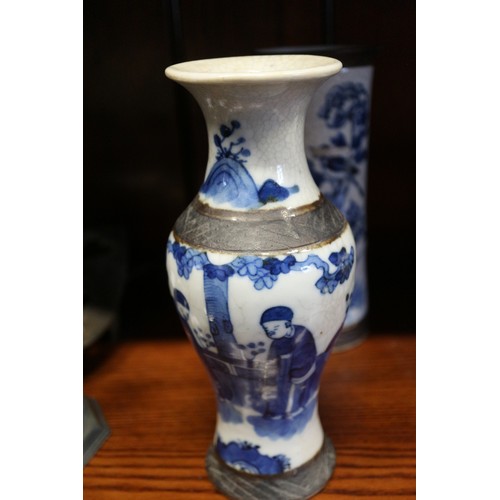 75 - A pair of Chinese porcelain crackle ware vases with figure decoration, 8