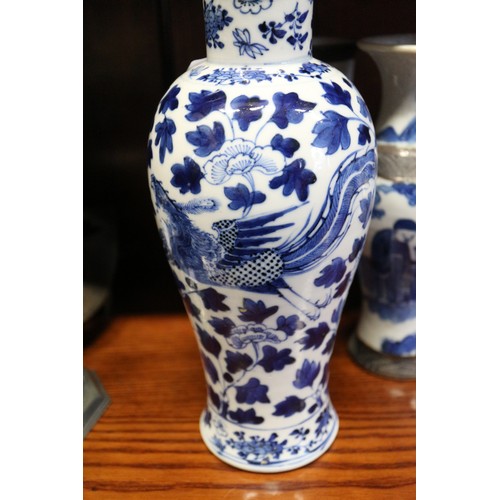 75 - A pair of Chinese porcelain crackle ware vases with figure decoration, 8