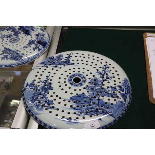 65 - A Chinese export blue and white circular dish drainer with landscape decoration, 13