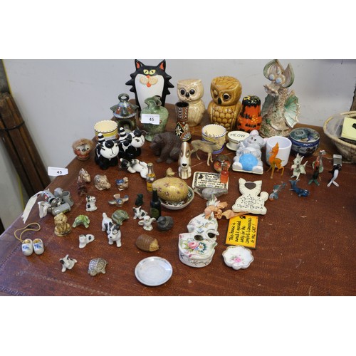 45 - A collection of ceramic and other miniatures, Wade animals, etc