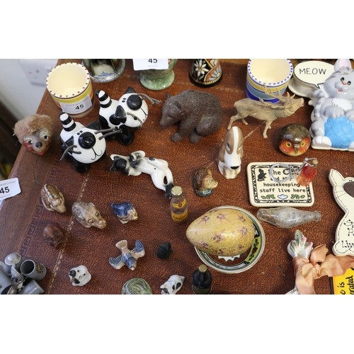 45 - A collection of ceramic and other miniatures, Wade animals, etc