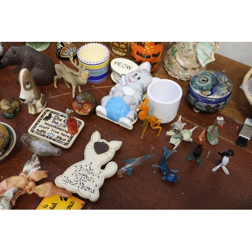 45 - A collection of ceramic and other miniatures, Wade animals, etc