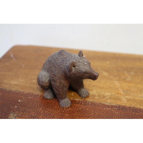 45 - A collection of ceramic and other miniatures, Wade animals, etc