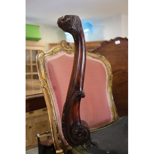 454 - A 19th century carved mahogany shape top stool, on acanthus scroll supports and lion paw feet, 20