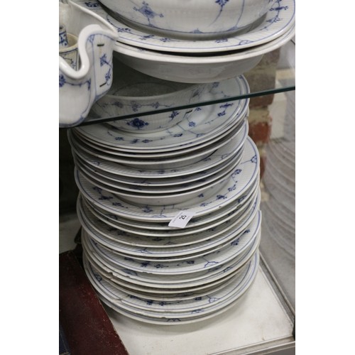 25 - A quantity of mostly Royal Copenhagen blue and white china including a tureen, platters, plates, cup... 