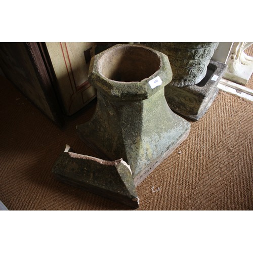 640 - A terracotta square base chimney pot, 14