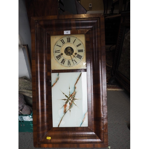 103 - A 1930s Ansonia oak cased wall clock with silvered dial, 33